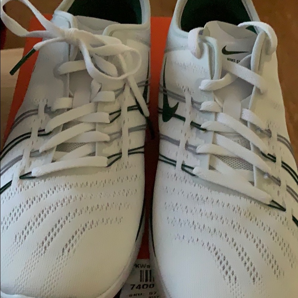 Nike shoes white and like a forest green